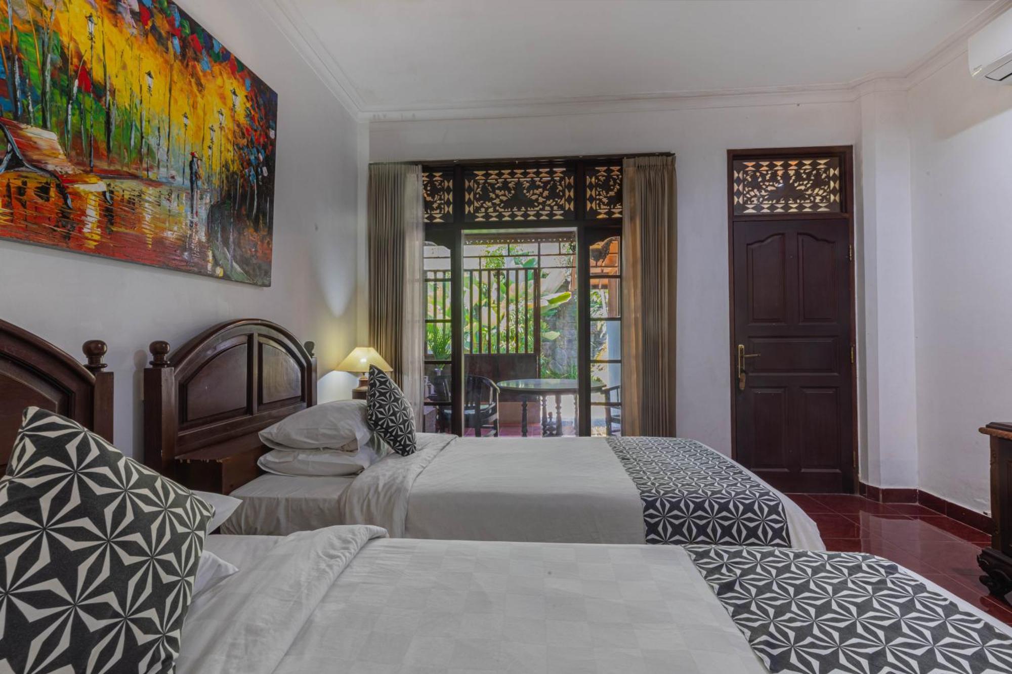 Puri Mango Guest House Sanur Exterior foto