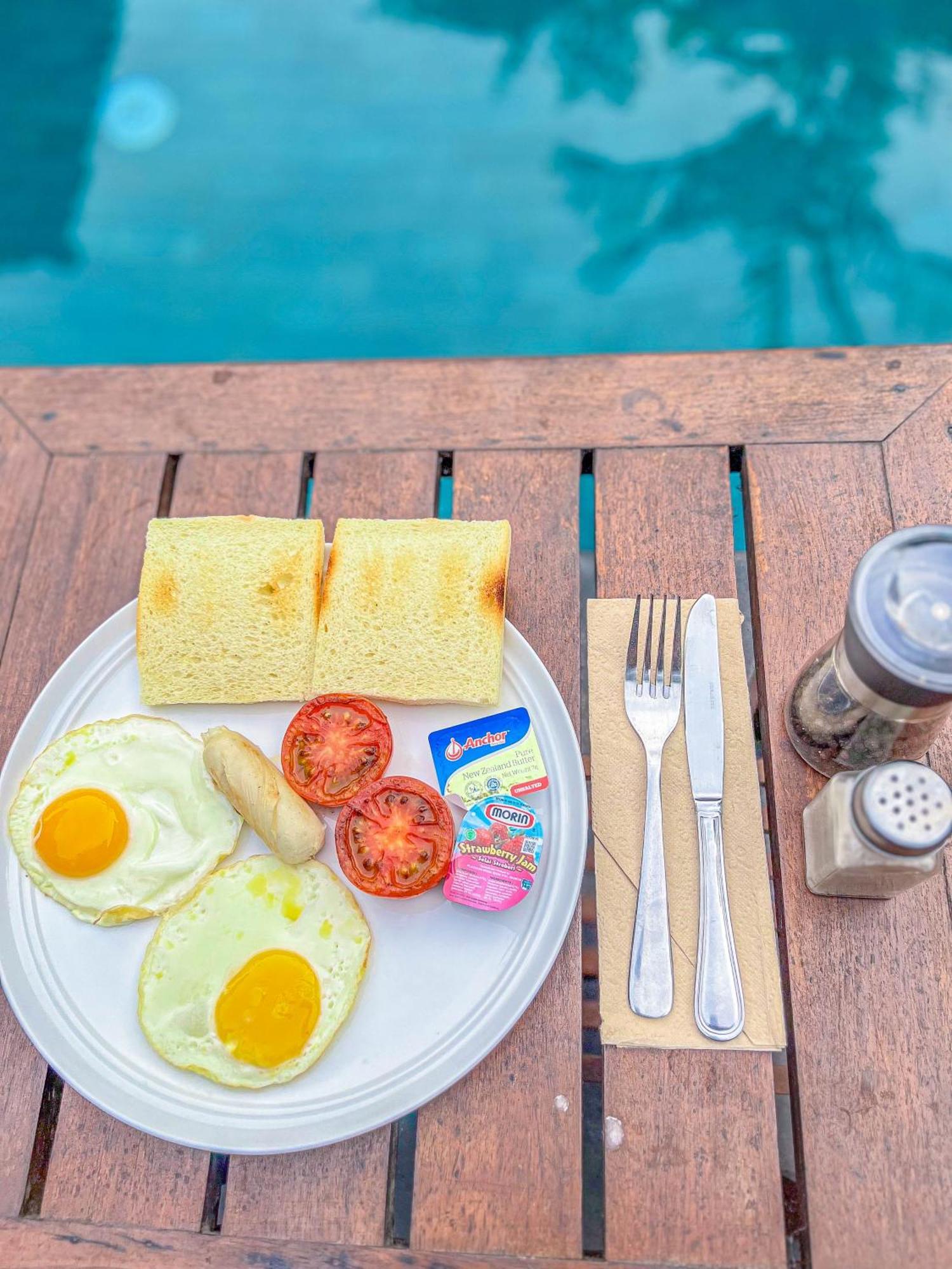 Puri Mango Guest House Sanur Exterior foto