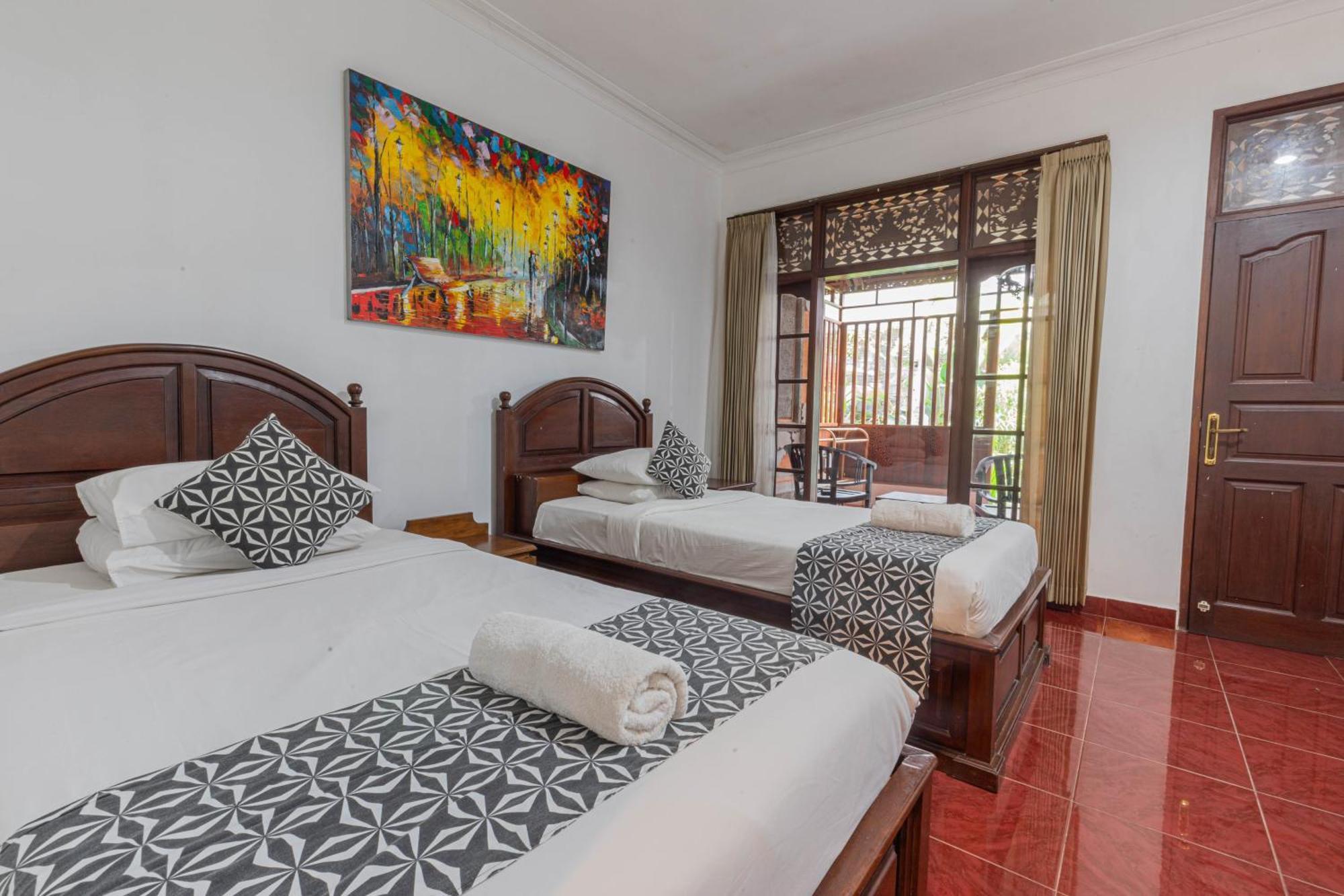 Puri Mango Guest House Sanur Exterior foto